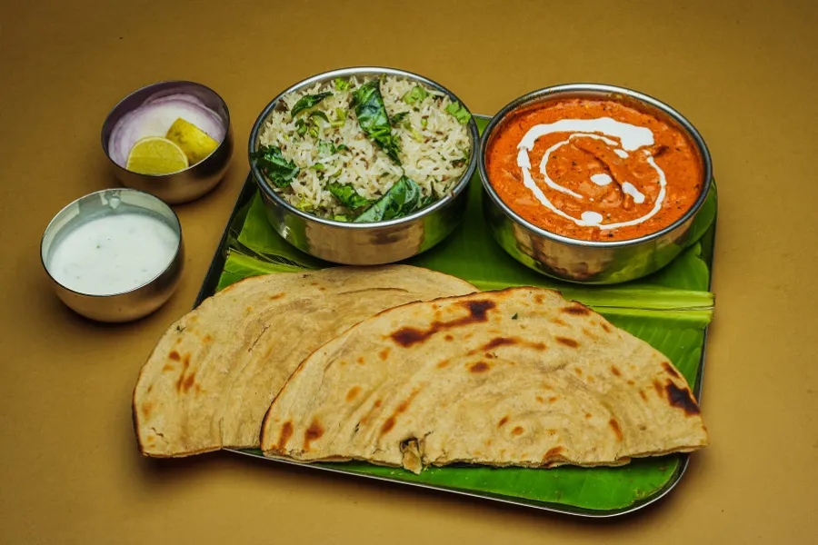 Jeera Rice + Butter Chicken + Raitha